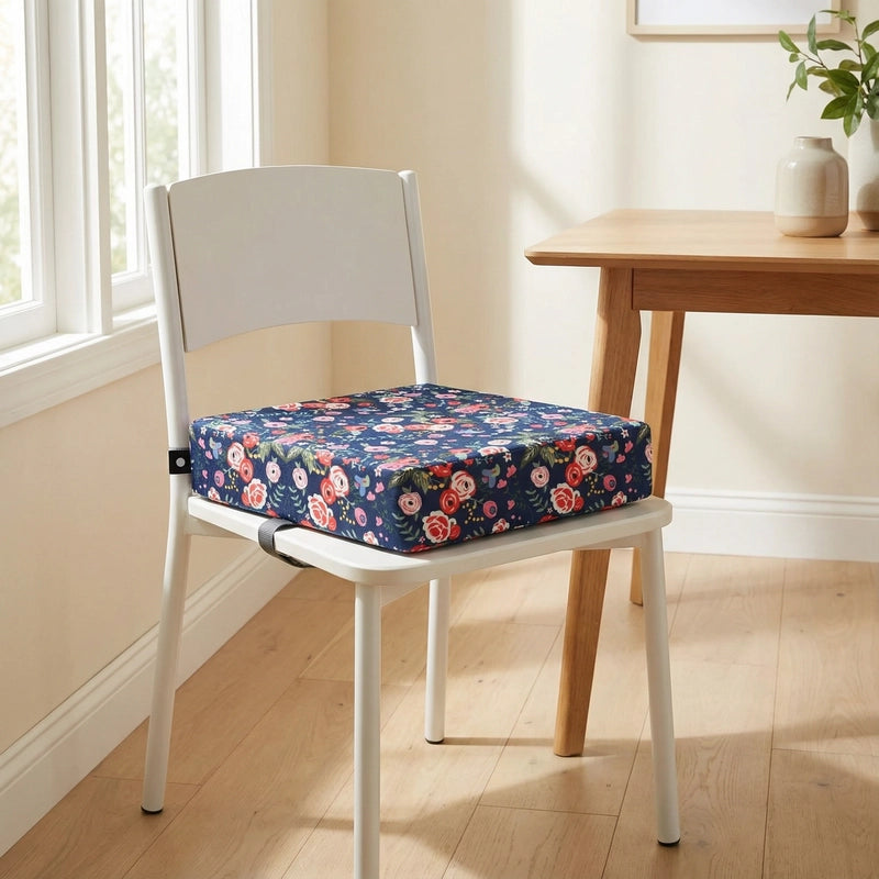 Coussin rehausseur floraison 32 cm installé sur une chaise