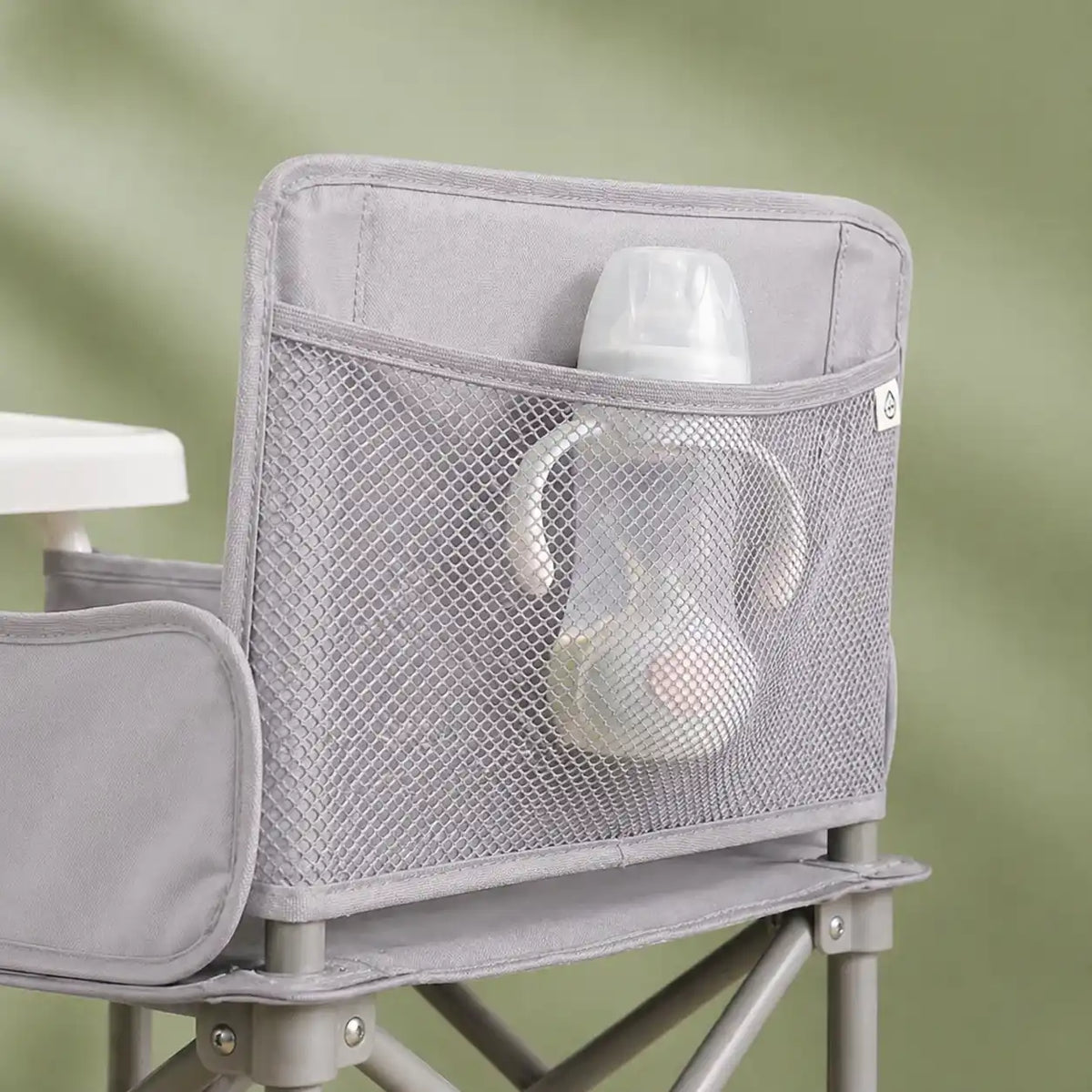Rehausseur pliable transport gris vue arrière format pliable visible