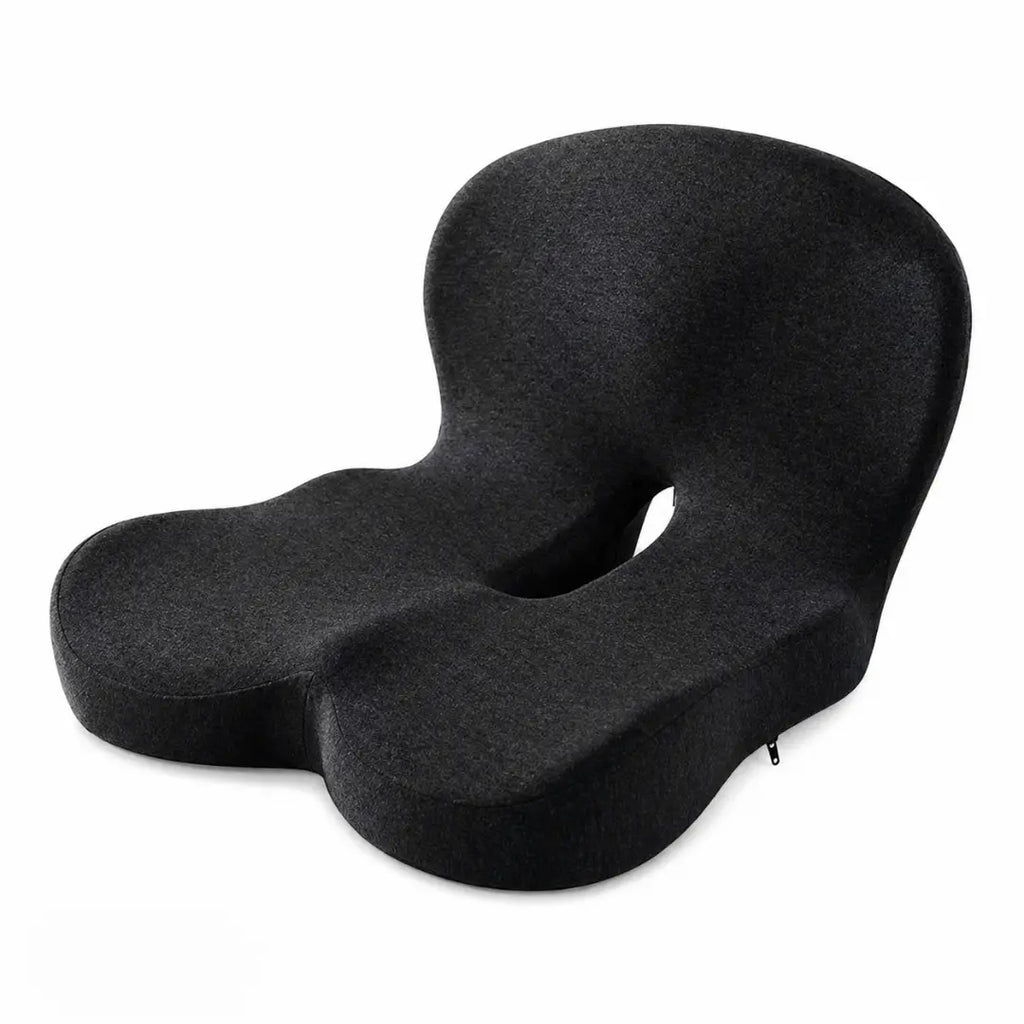 Coussin mémoire de forme coccyx noir sur fond blanc