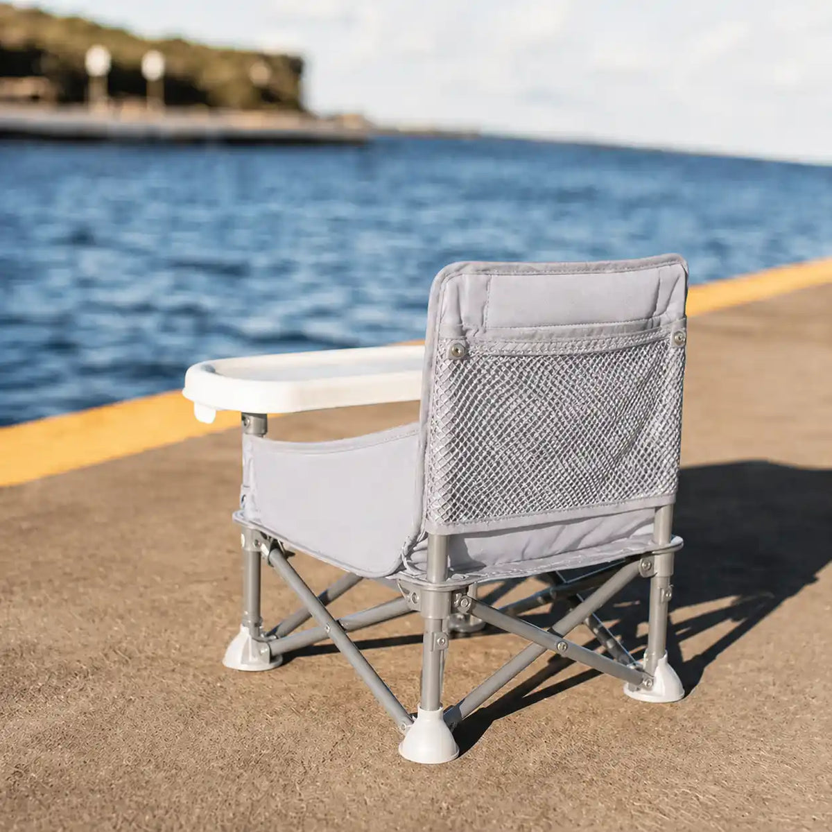 Rehausseur pliable transport gris format pliable visible mise en situation d'usage
