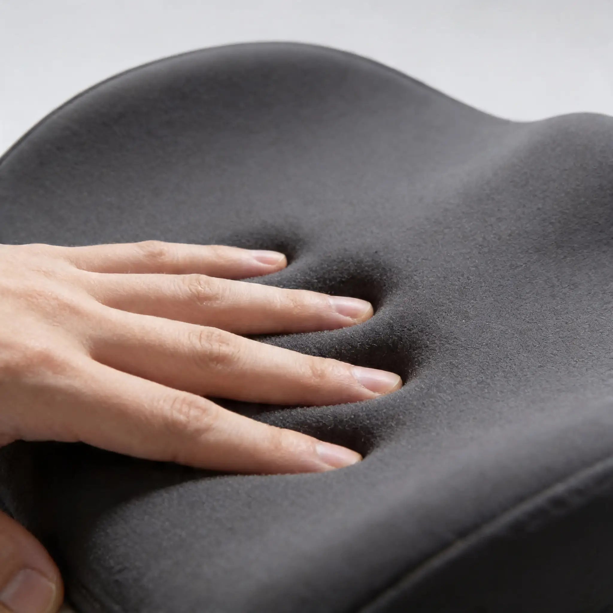Toucher_du_coussin_rehausseur Image